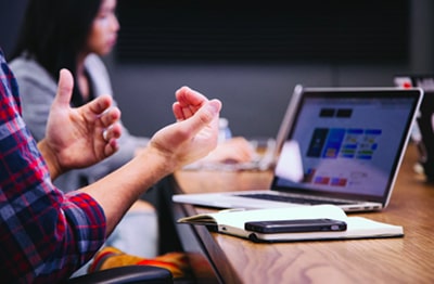 Man on a computer. Image source: https://unsplash.com/photos/5QgIuuBxKwM 